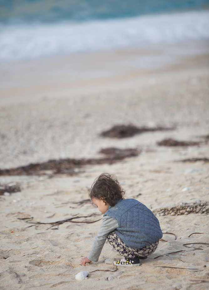 Kefalonia Fisheries - Girl playing on the beach